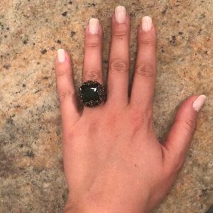 Cocktail ring with green stone